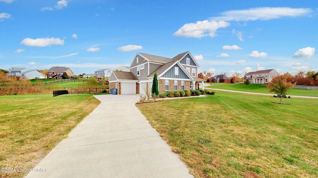 view of front of home with a garage and a front yard