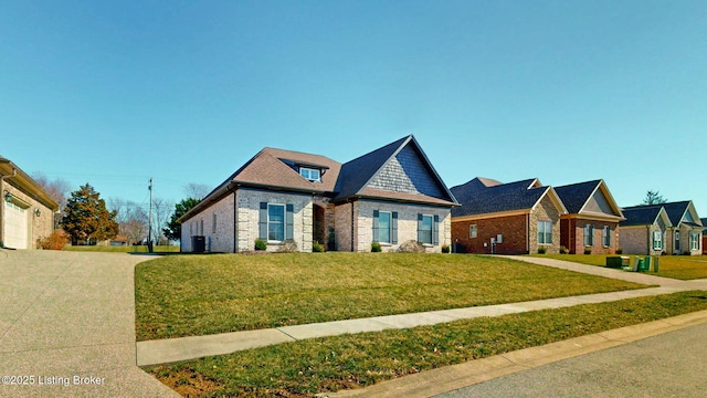 craftsman house featuring driveway, a front lawn, and brick siding