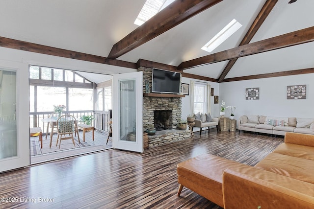 13200 Creekview Rd, Prospect, KY 40059 - living area with a skylight, a stone fireplace, beamed ceiling, and wood finished floors