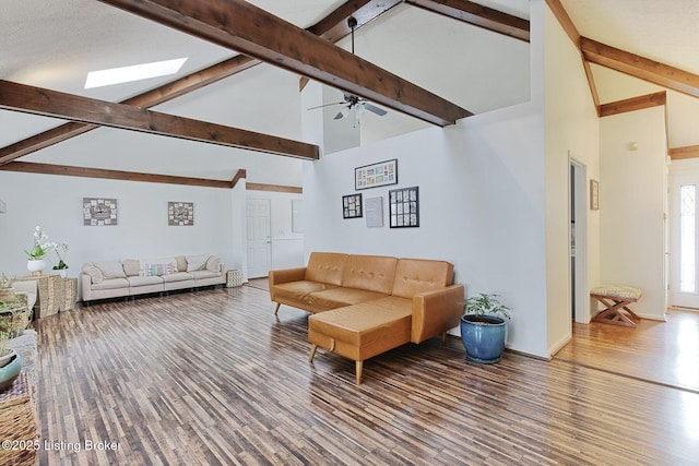 13200 Creekview Rd, Prospect, KY 40059 - living area featuring baseboards, beam ceiling, wood finished floors, a skylight, and high vaulted ceiling