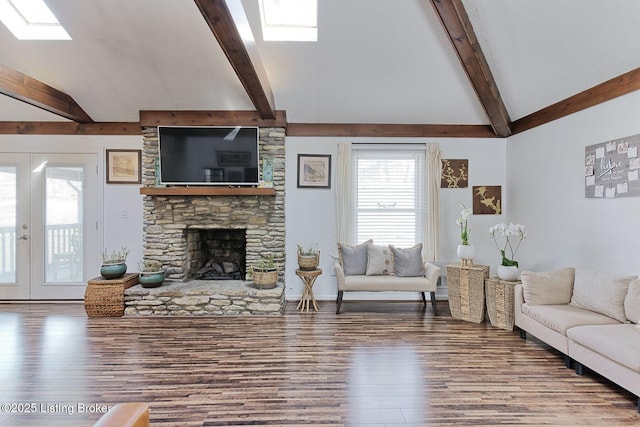 13200 Creekview Rd, Prospect, KY 40059 - living room featuring wood finished floors, a stone fireplace, and a wealth of natural light