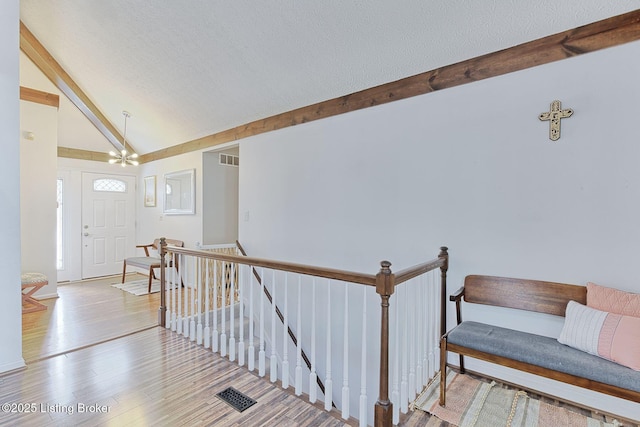 13200 Creekview Rd, Prospect, KY 40059 - interior space featuring a textured ceiling, wood finished floors, lofted ceiling with beams, and visible vents