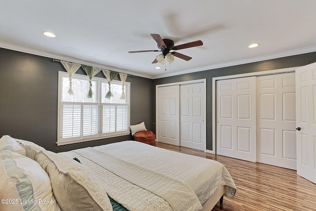13200 Creekview Rd, Prospect, KY 40059 - bedroom featuring wood finished floors, recessed lighting, ornamental molding, and multiple closets