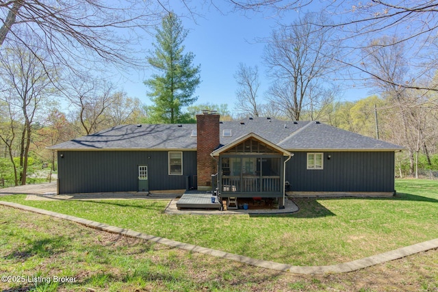 13200 Creekview Rd, Prospect, KY 40059 - rear view of house with a yard, a wooden deck, a shingled roof, and a chimney