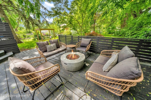 4708 S 3rd St, Louisville, KY 40214 - wooden deck featuring an outdoor living space with a fire pit
