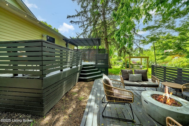 4708 S 3rd St, Louisville, KY 40214 - wooden terrace with an outdoor fire pit