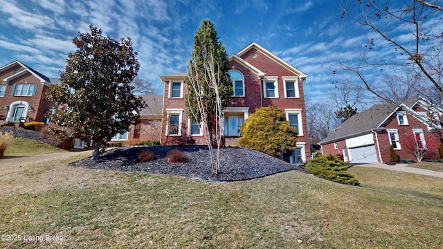 view of front of home featuring a garage and a front yard