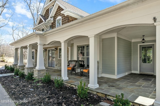 view of patio featuring a porch