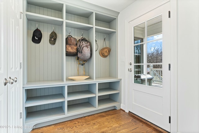 mudroom featuring dark wood finished floors