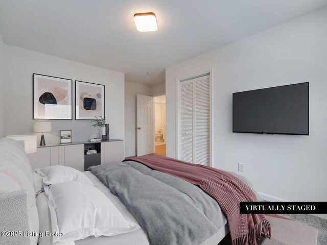 bedroom featuring a closet and baseboards