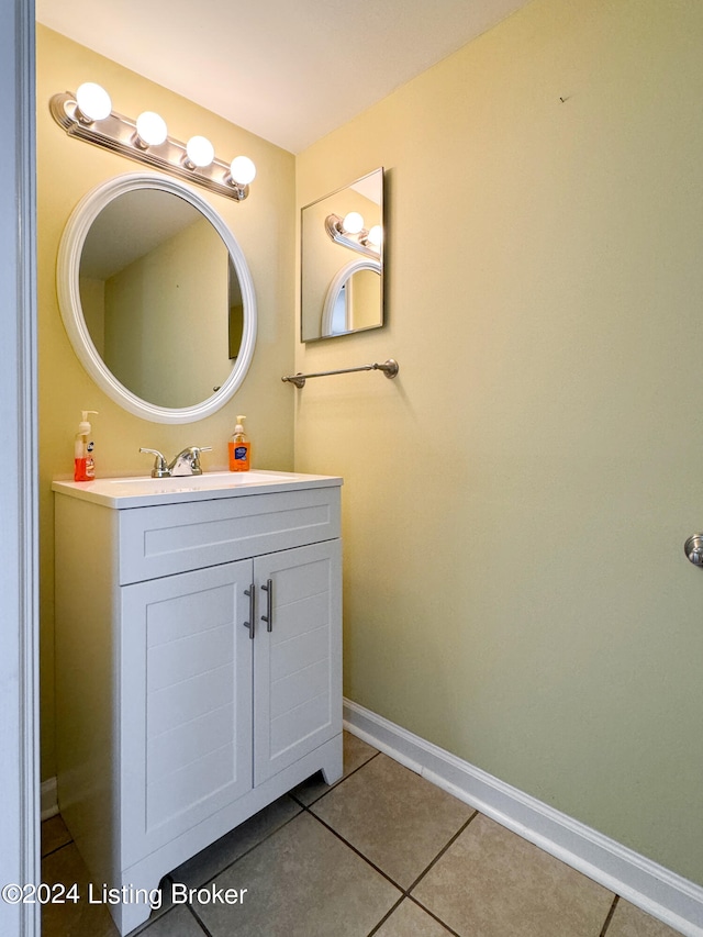 bathroom featuring tile patterned floors and vanity