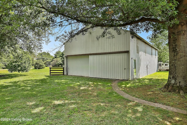 view of outdoor structure featuring a yard