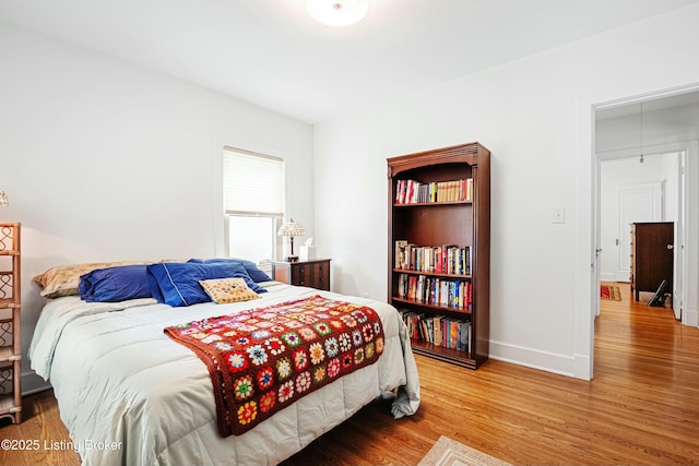 bedroom featuring wood-type flooring