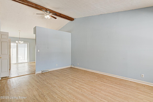 unfurnished room with light wood-type flooring, vaulted ceiling with beams, a textured ceiling, and ceiling fan with notable chandelier