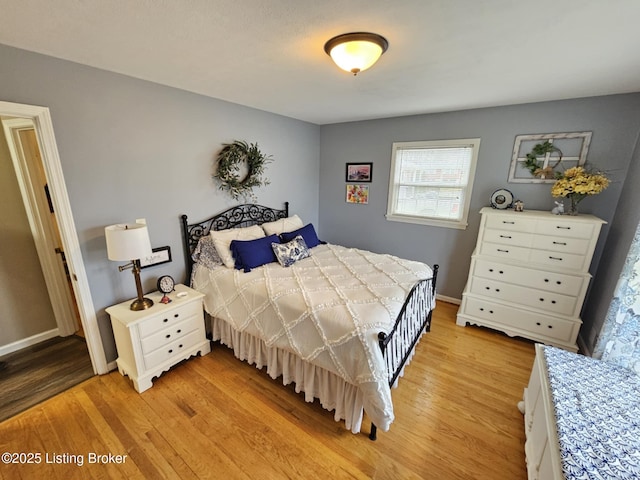 bedroom featuring light hardwood / wood-style flooring