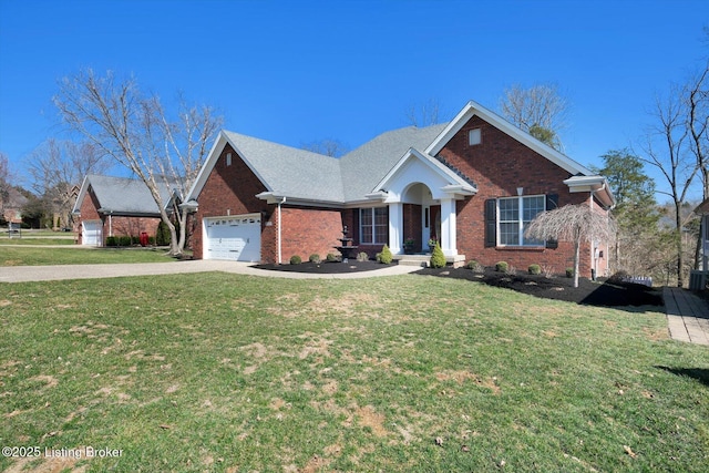 view of front of home with a front lawn, brick siding, concrete driveway, and an attached garage