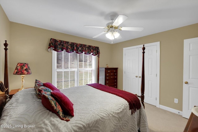 bedroom with baseboards, light carpet, and ceiling fan