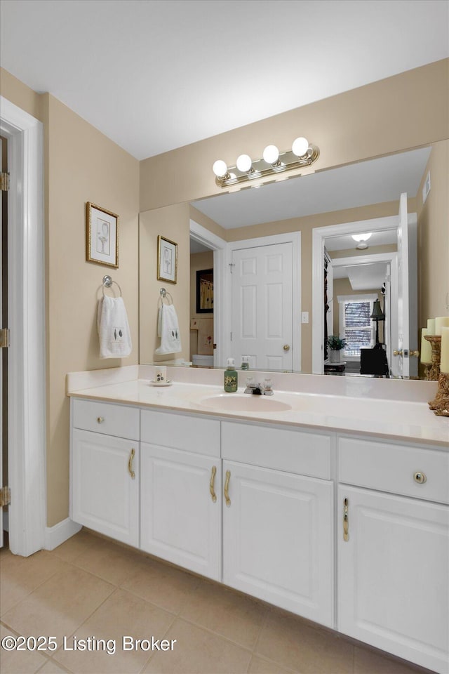 bathroom featuring vanity and tile patterned floors