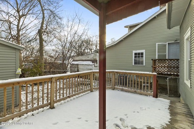 view of snow covered deck