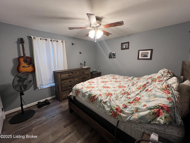 bedroom with hardwood / wood-style flooring and ceiling fan