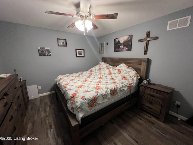 bedroom with dark wood-type flooring and ceiling fan