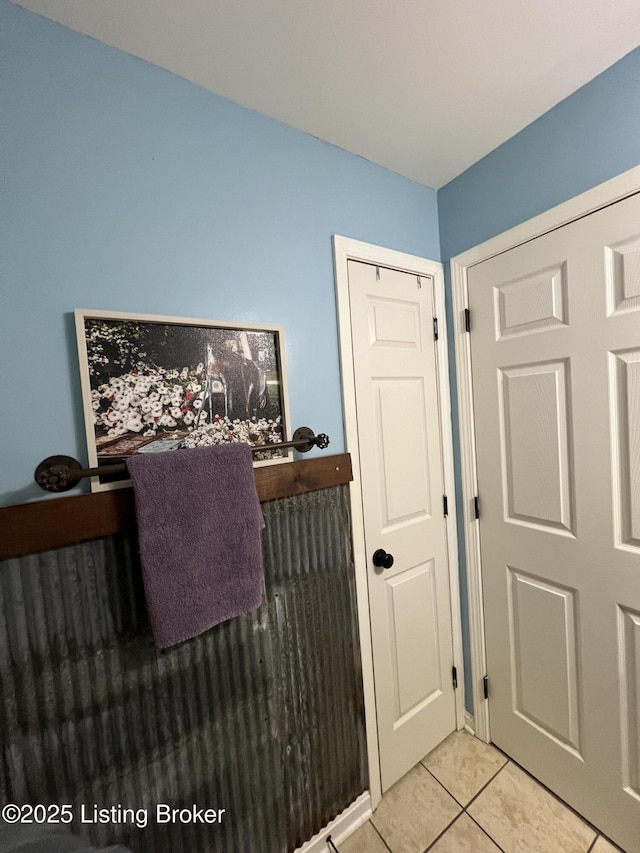 interior space with light tile patterned floors