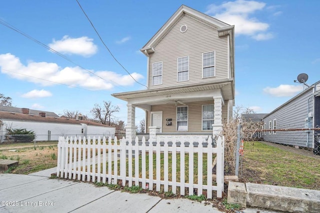 view of front of home with a porch and a fenced front yard