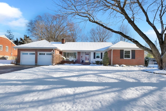 single story home featuring a garage