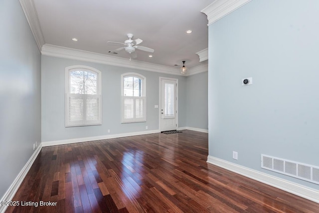 unfurnished living room with dark wood-style flooring, recessed lighting, visible vents, ornamental molding, and baseboards