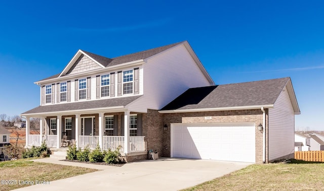 view of front facade with an attached garage, covered porch, brick siding, a shingled roof, and driveway