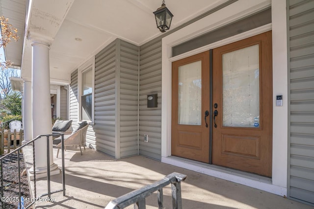 property entrance featuring french doors