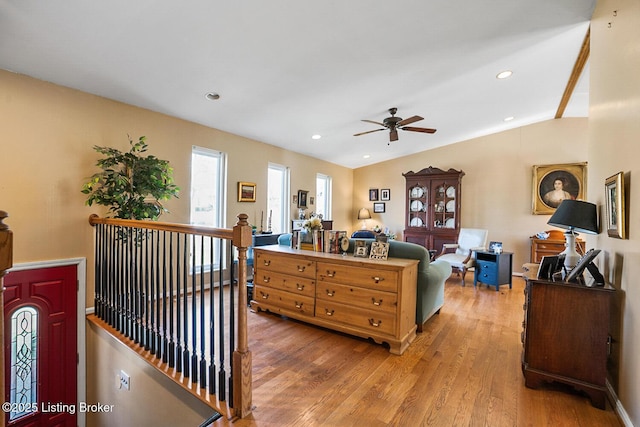 bedroom with baseboards, a ceiling fan, lofted ceiling, wood finished floors, and recessed lighting