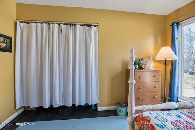 bedroom with baseboards