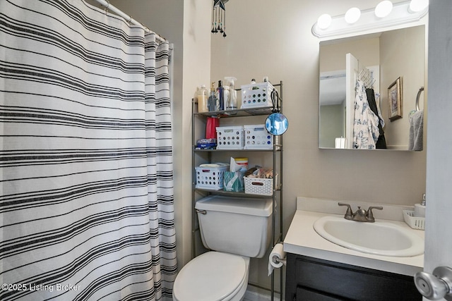 full bath featuring toilet, a shower with curtain, and vanity