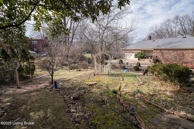 view of yard with fence