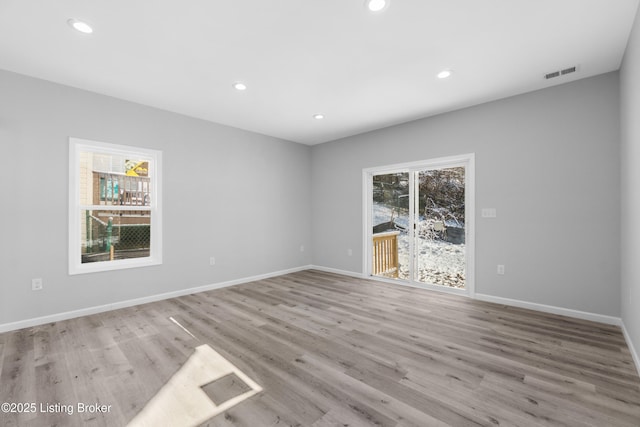 empty room with light wood-type flooring