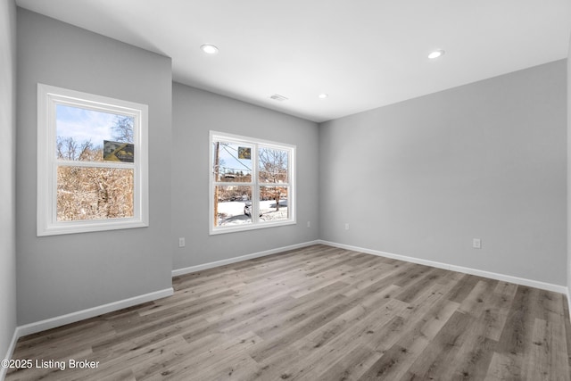 empty room featuring light hardwood / wood-style floors