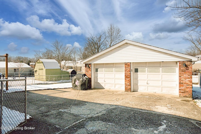 9914 Mccrea Ln, Louisville, KY 40229 - detached garage featuring driveway