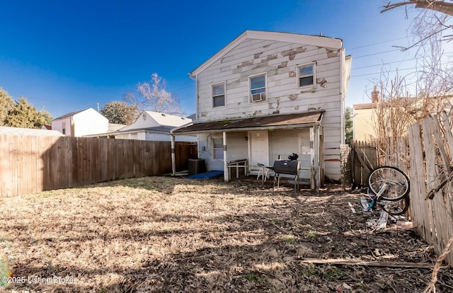 back of property with central AC unit