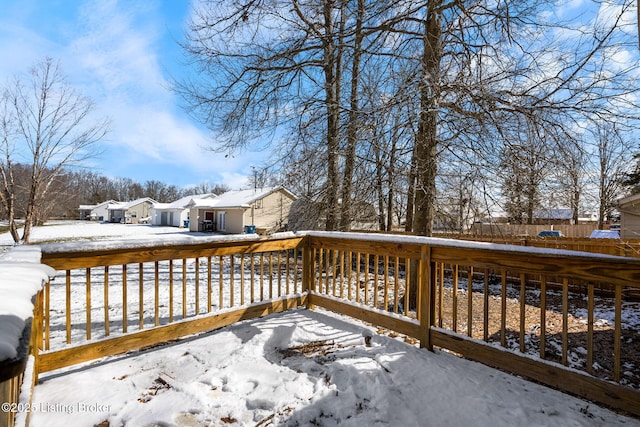 view of snow covered deck