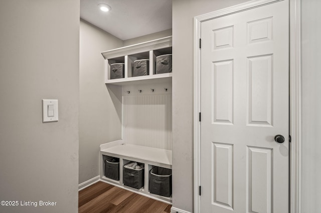 mudroom with baseboards and wood finished floors