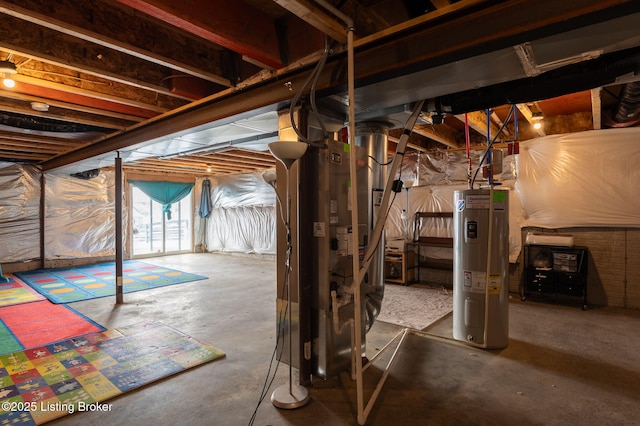 below grade area featuring electric water heater