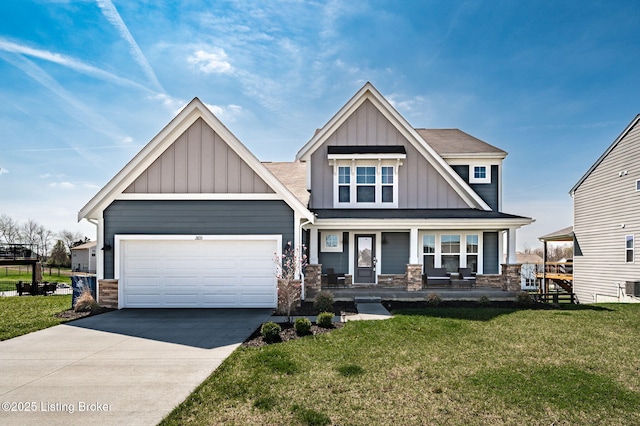 craftsman inspired home with an attached garage, stone siding, board and batten siding, concrete driveway, and a front lawn