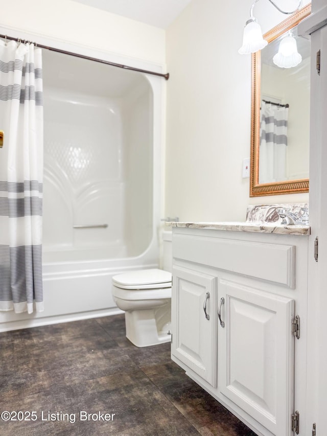 full bathroom featuring shower / bathtub combination with curtain, vanity, and toilet