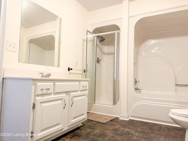 bathroom with toilet and vanity