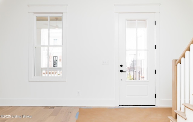 entrance foyer featuring light hardwood / wood-style floors