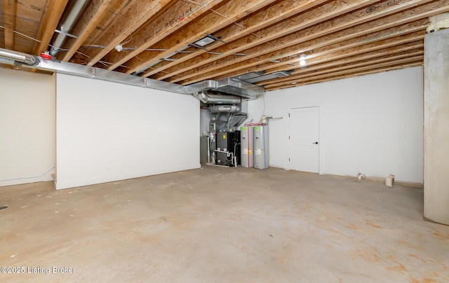 basement featuring heating unit and water heater