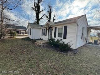 view of front of home with a front yard