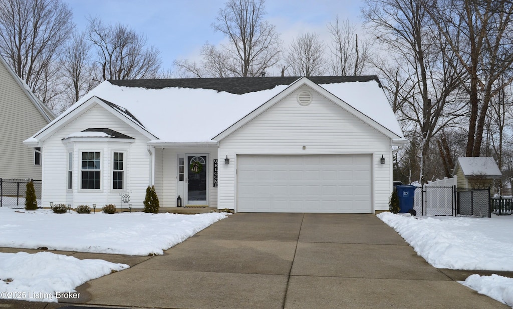 ranch-style home with a garage