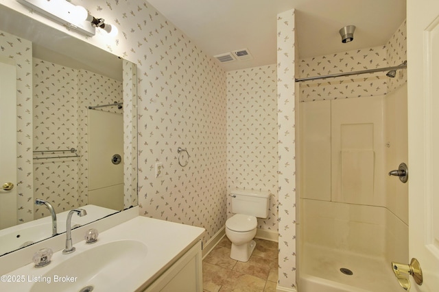 full bathroom featuring toilet, wallpapered walls, a shower stall, and visible vents